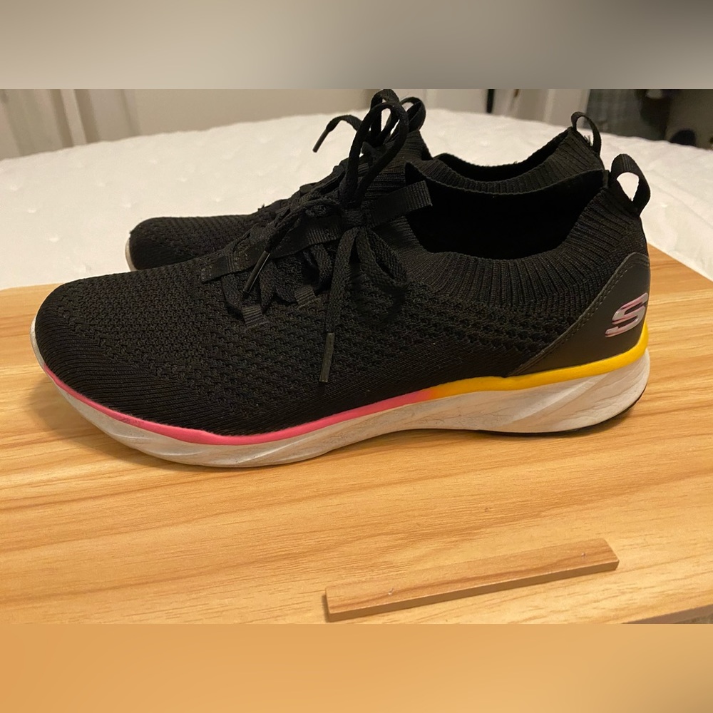 Women’s size 11 Skechers.
